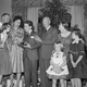 Image for article titled 70 Years of First Ladies Standing in Front of Christmas Trees